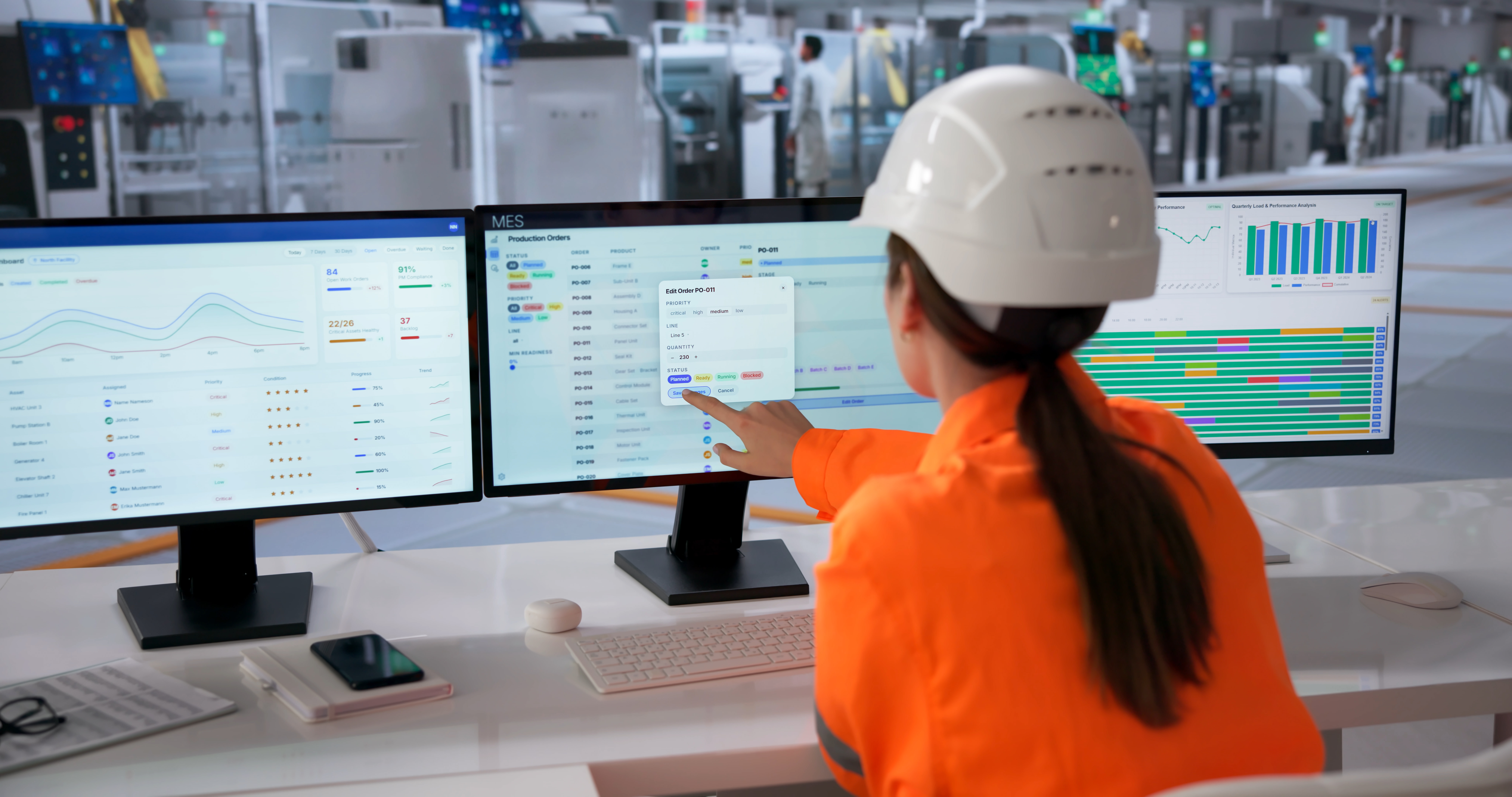 Manufacturing operator reviewing production orders and schedules across multiple monitors.